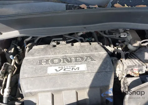 2010 Honda Pilot Touring из США, поврежденный, VIN 5FNYF4H97AB018395